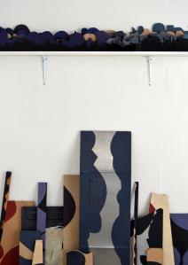 painted scrap displayed with shelf